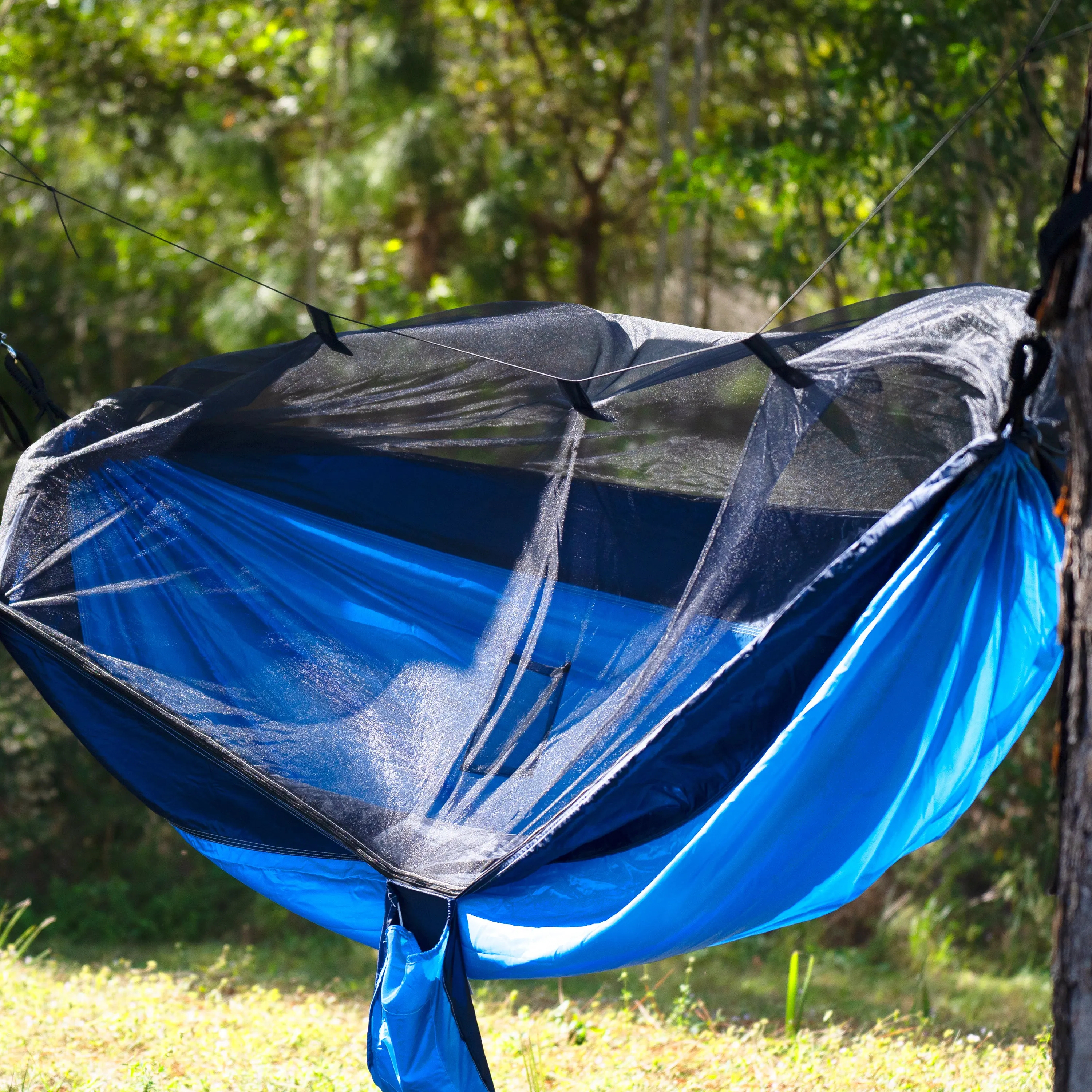 Hammock in a Bag w/ Mosquito Net & Adjustable Tree Straps | 54-in. Wide | Weather & UV Resistant | 350 Lb. Capacity